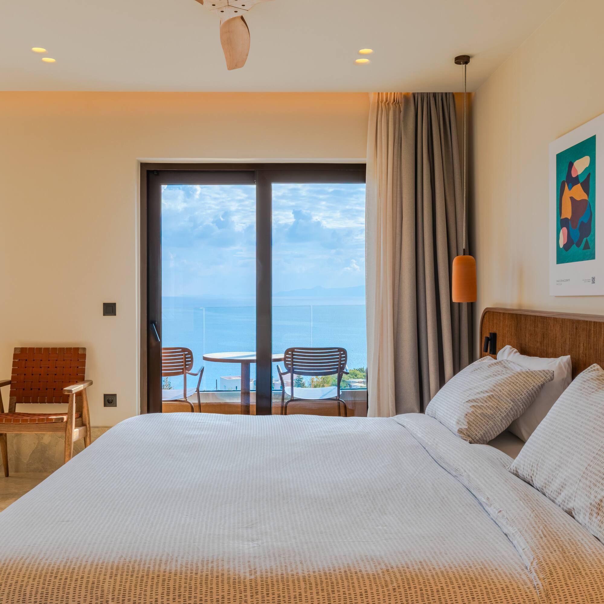 a bed with a view of the ocean