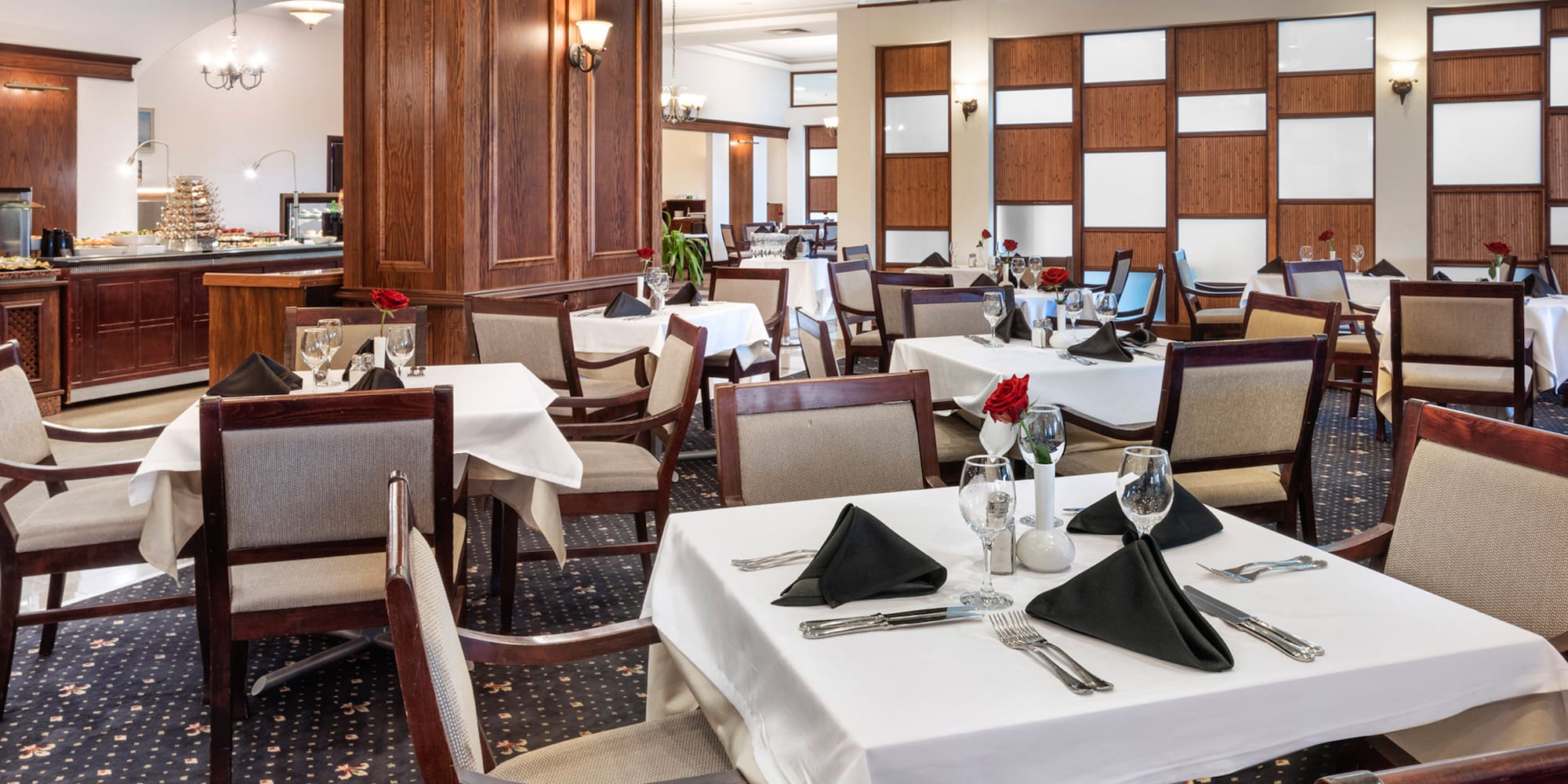 a restaurant with tables and chairs