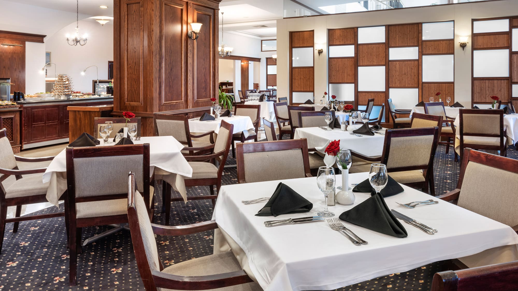 a restaurant with tables and chairs