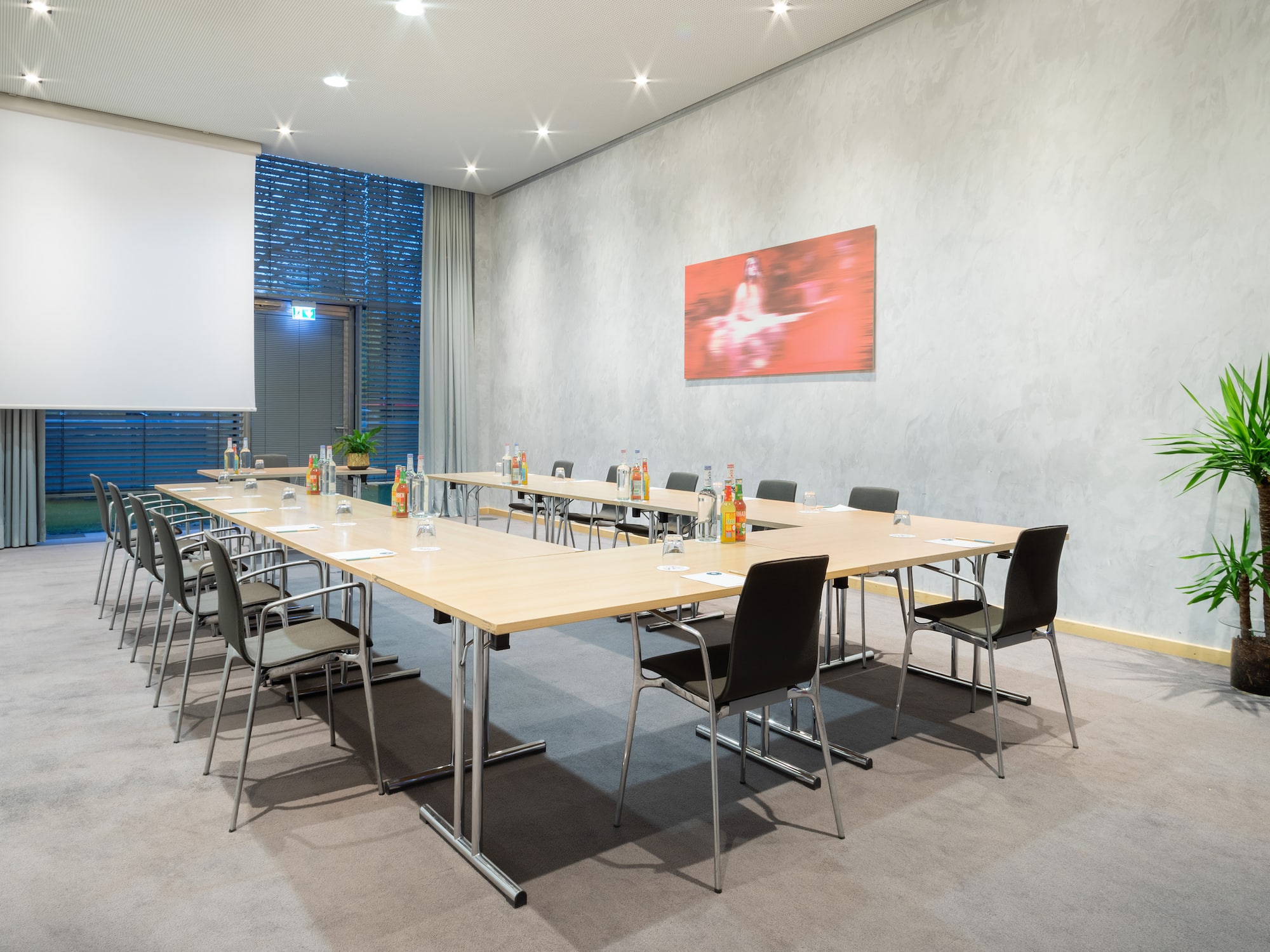 a room with a table and chairs