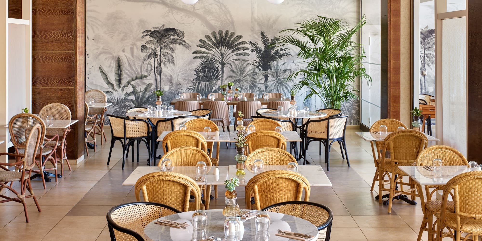 a restaurant with tables and chairs