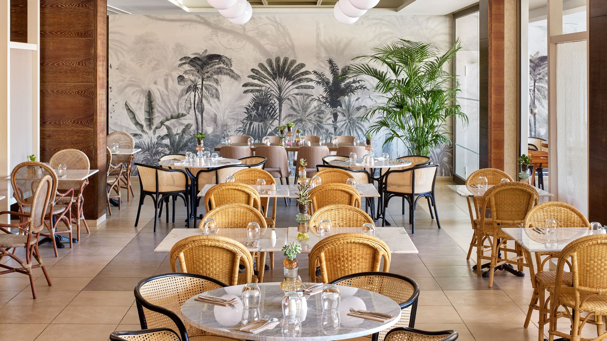 a restaurant with tables and chairs