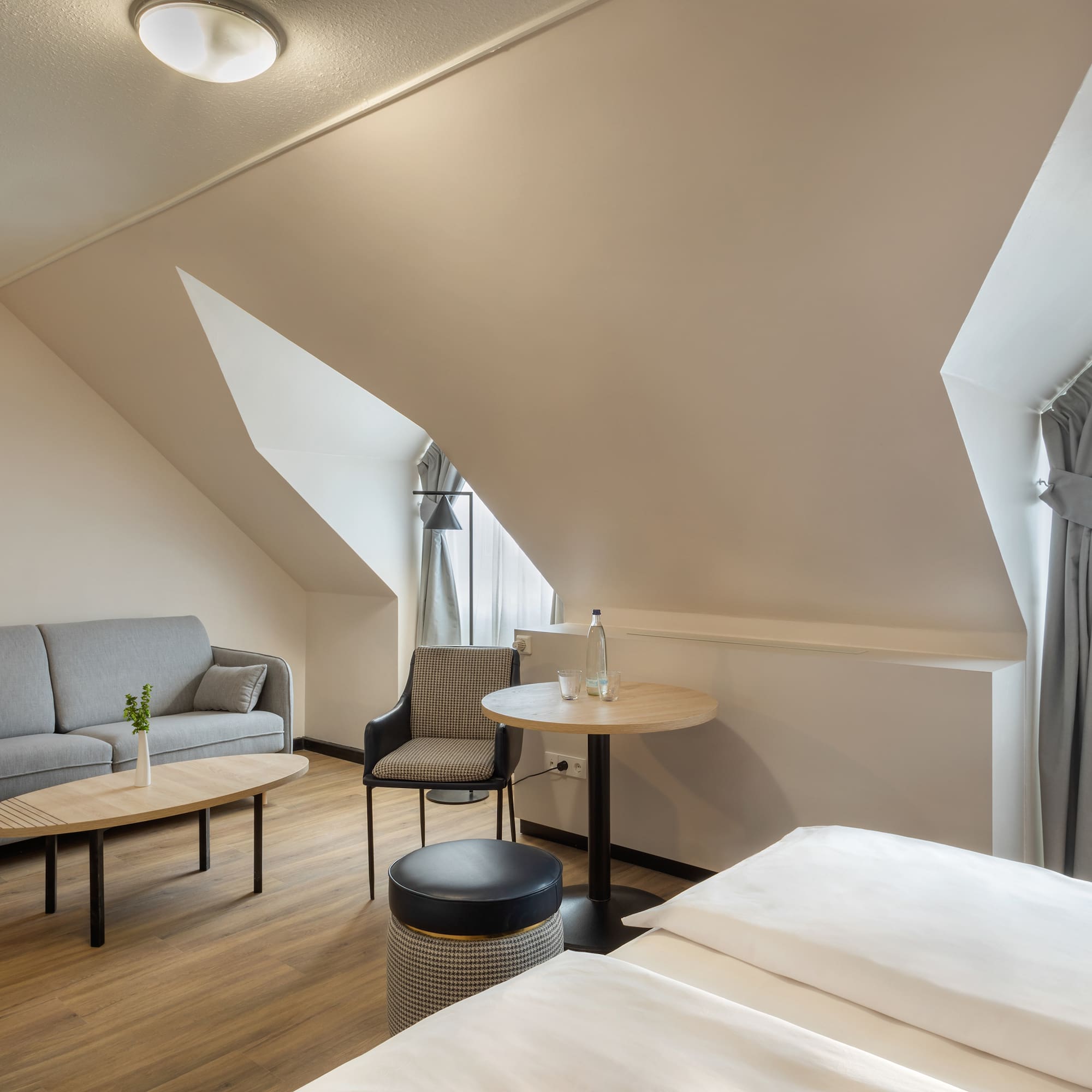 a room with a couch and a sofa