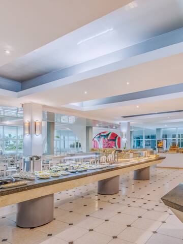 a large room with a buffet table