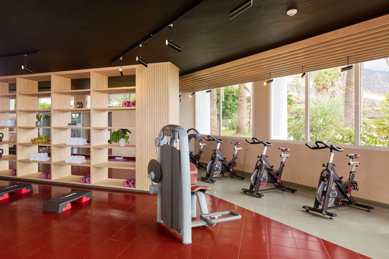 a room with exercise bikes and exercise equipment