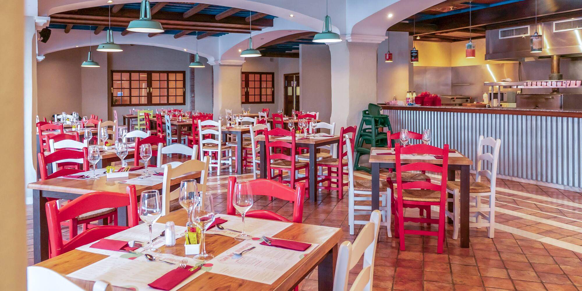 a room with tables and chairs