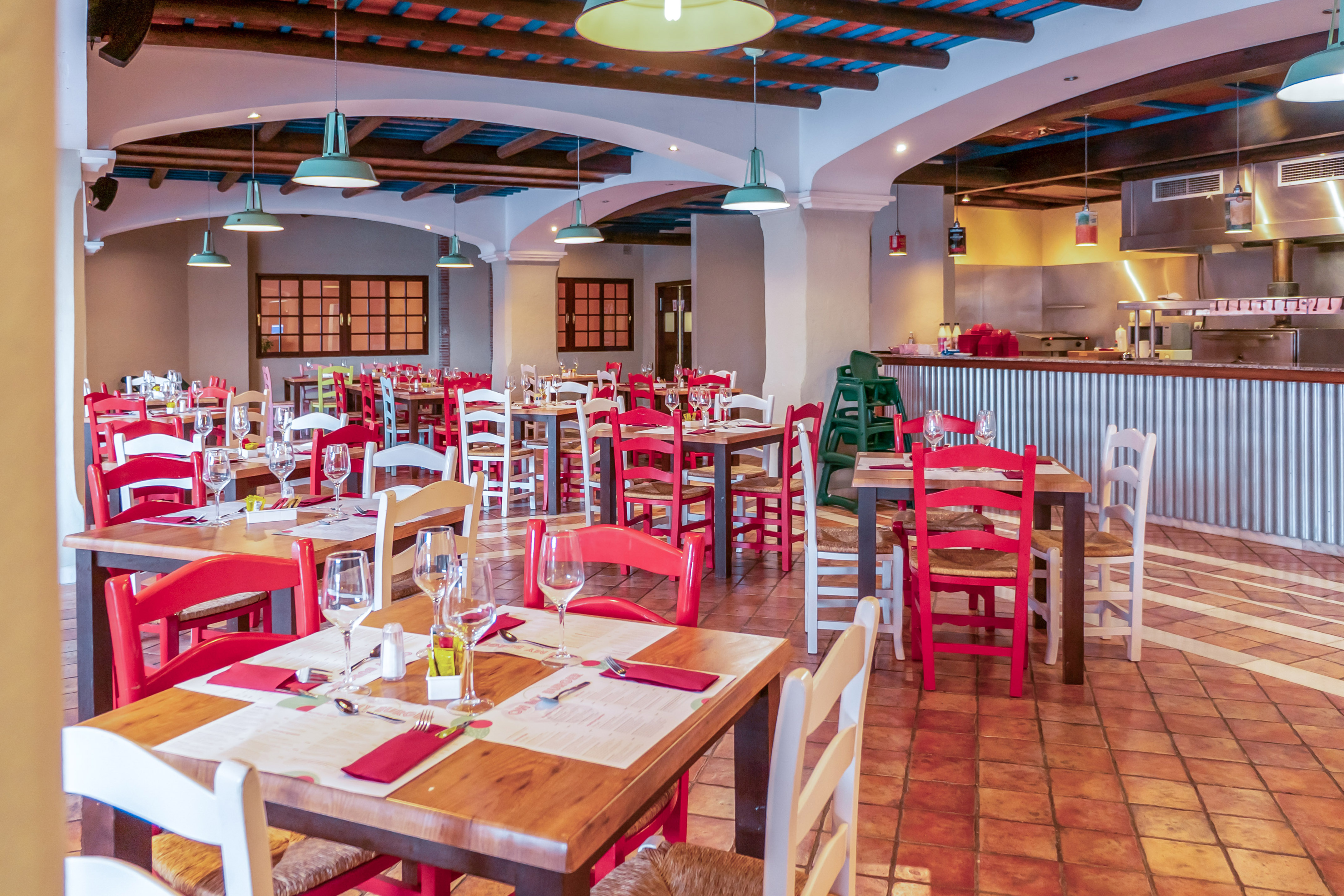 a room with tables and chairs