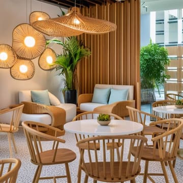 a room with chairs and tables