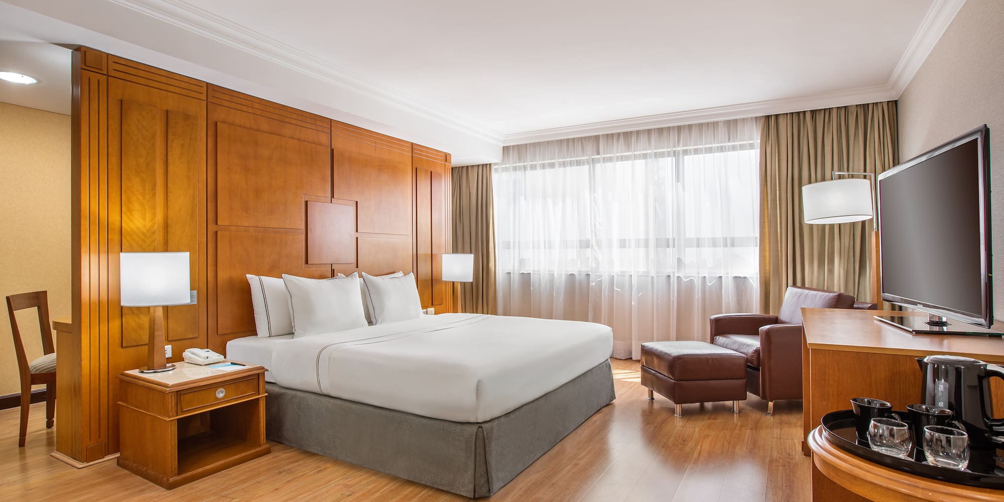 a room with a bed and a chair