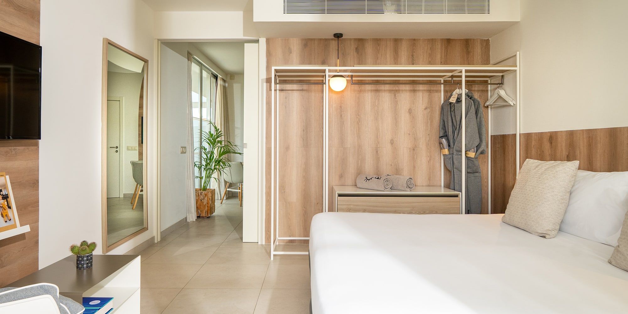 a room with a bed and closet