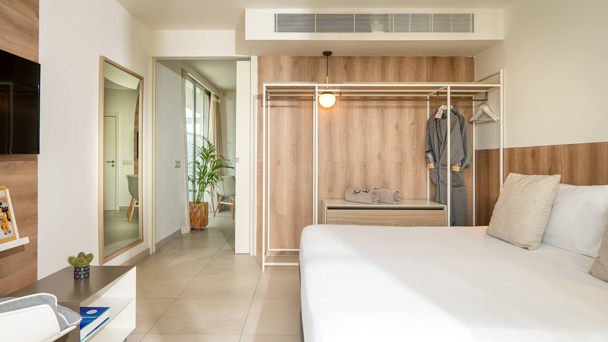 a room with a bed and closet