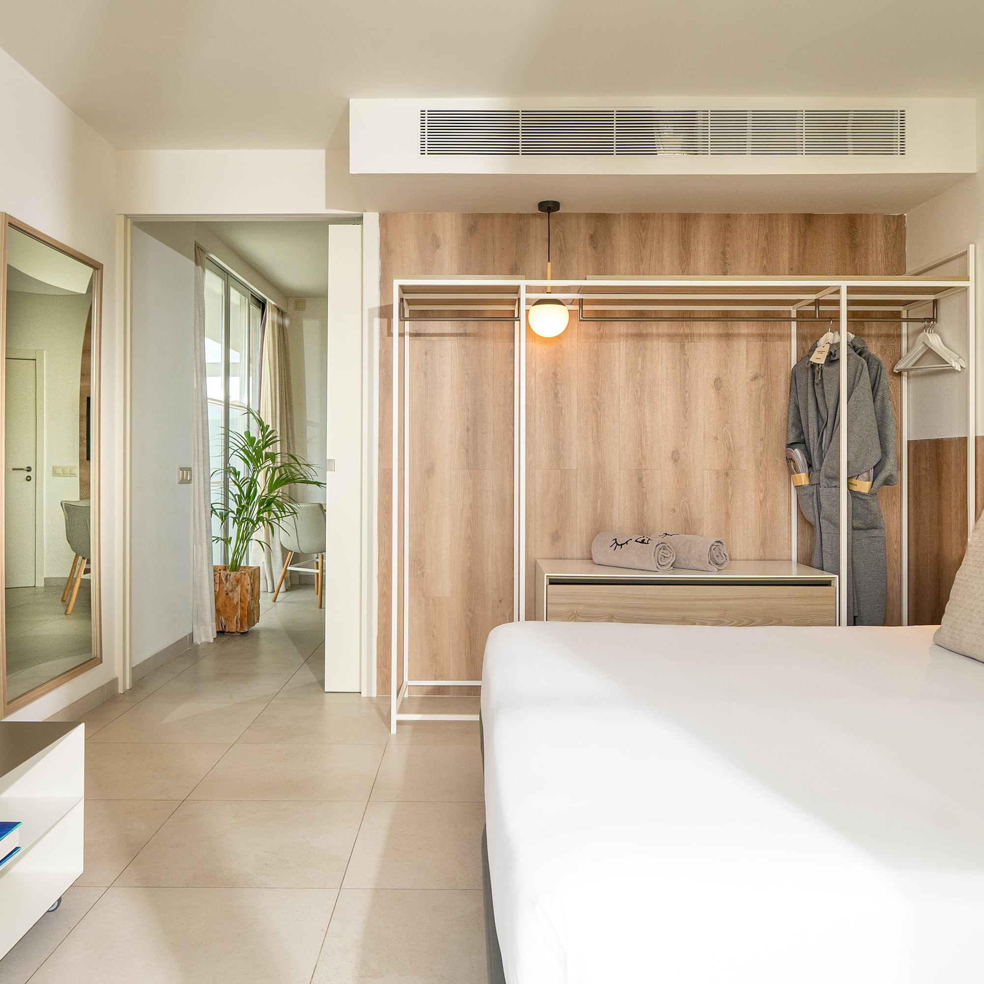 a room with a bed and closet