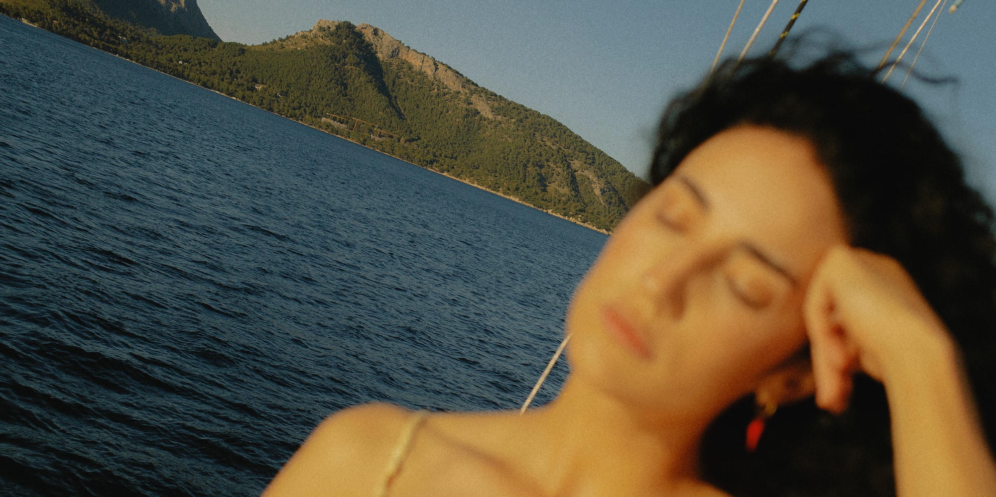 a woman lying on a boat