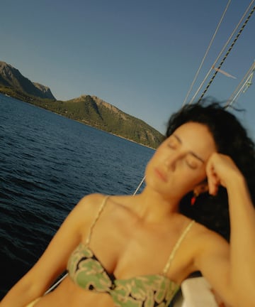 a woman lying on a boat