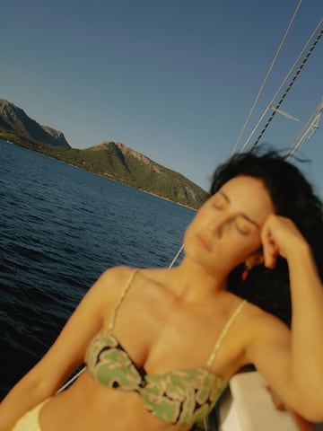 a woman lying on a boat