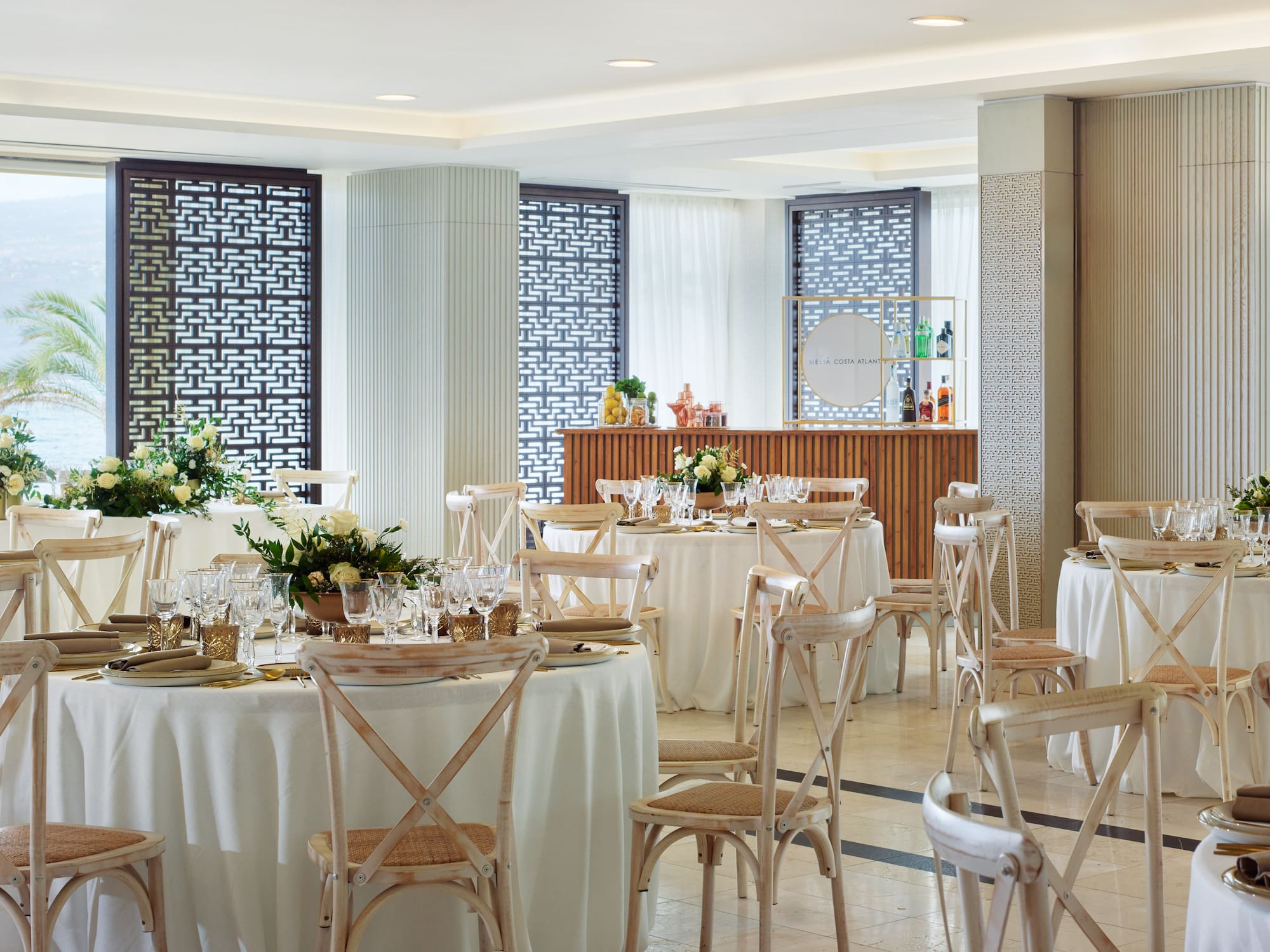 a room with tables and chairs