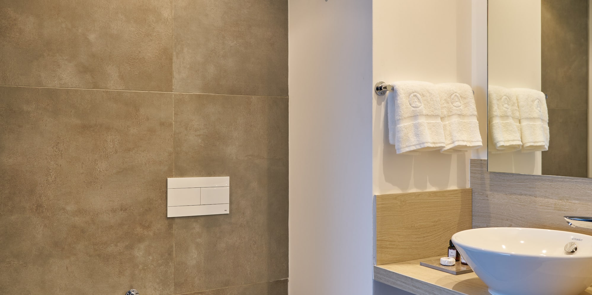 a bathroom with a sink and toilet