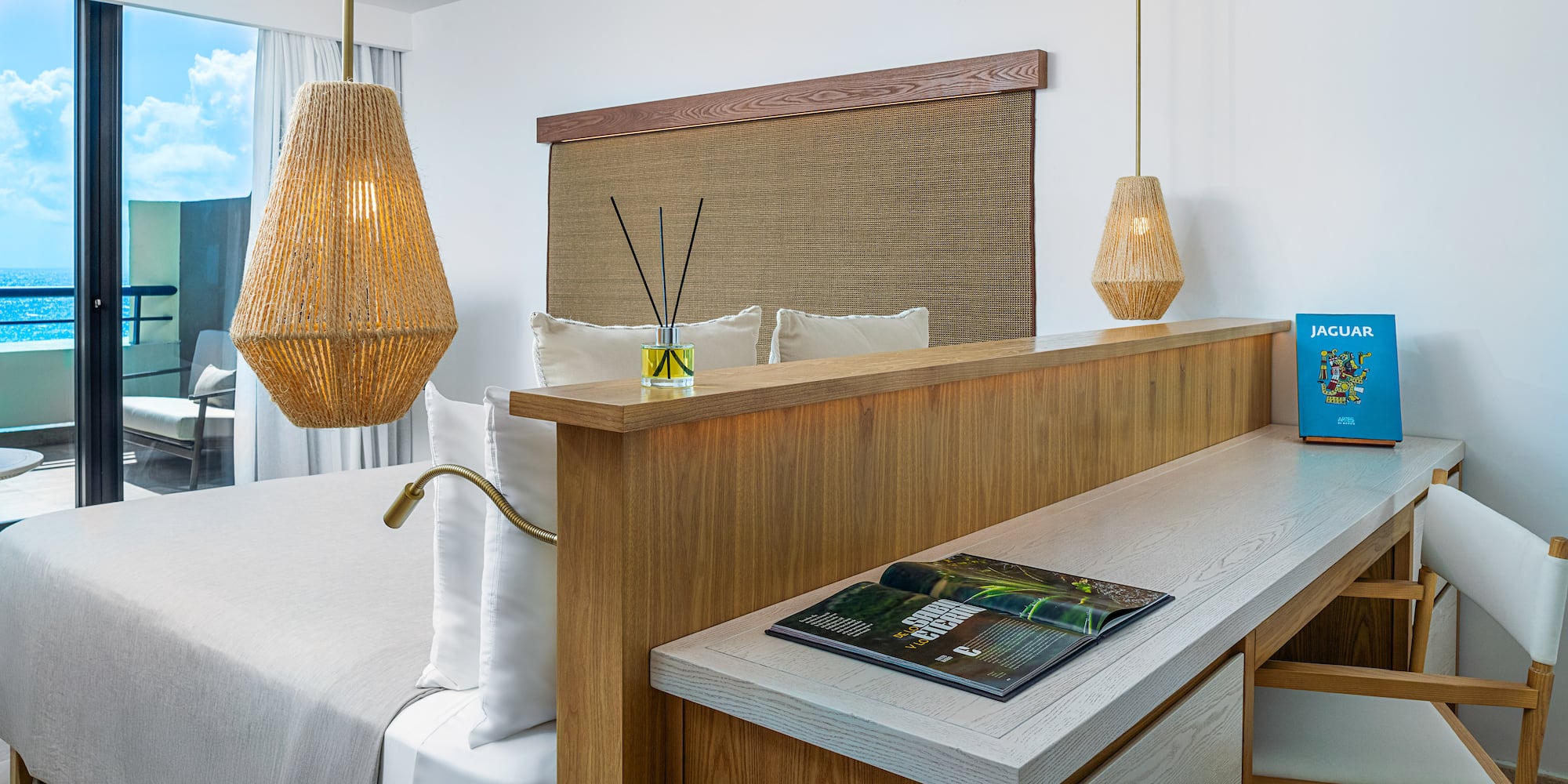 a room with a bed and a desk