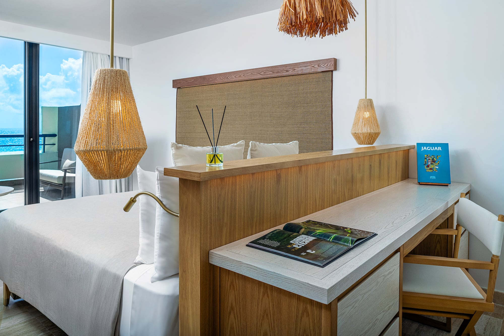 a room with a bed and a desk