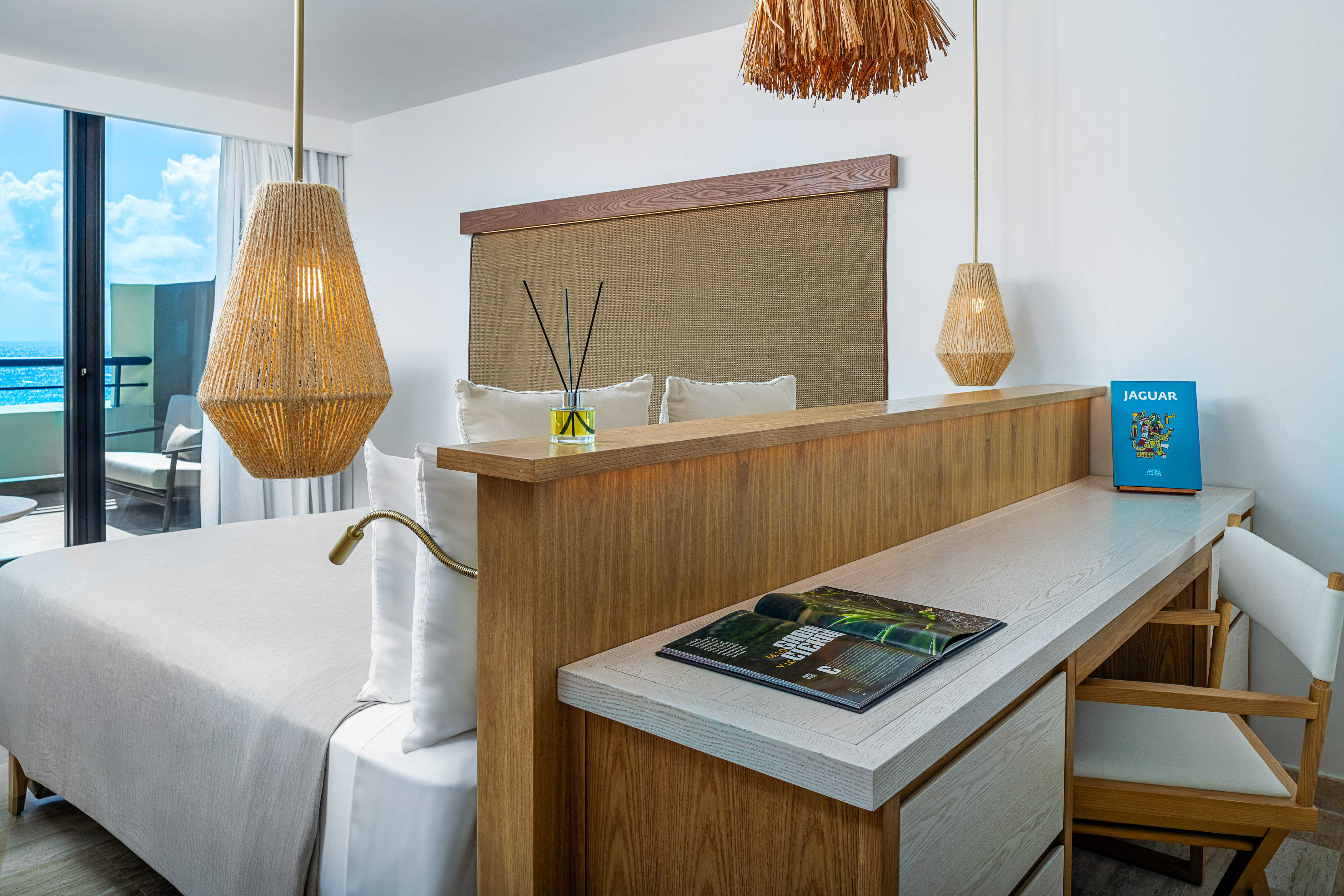 a room with a bed and a desk