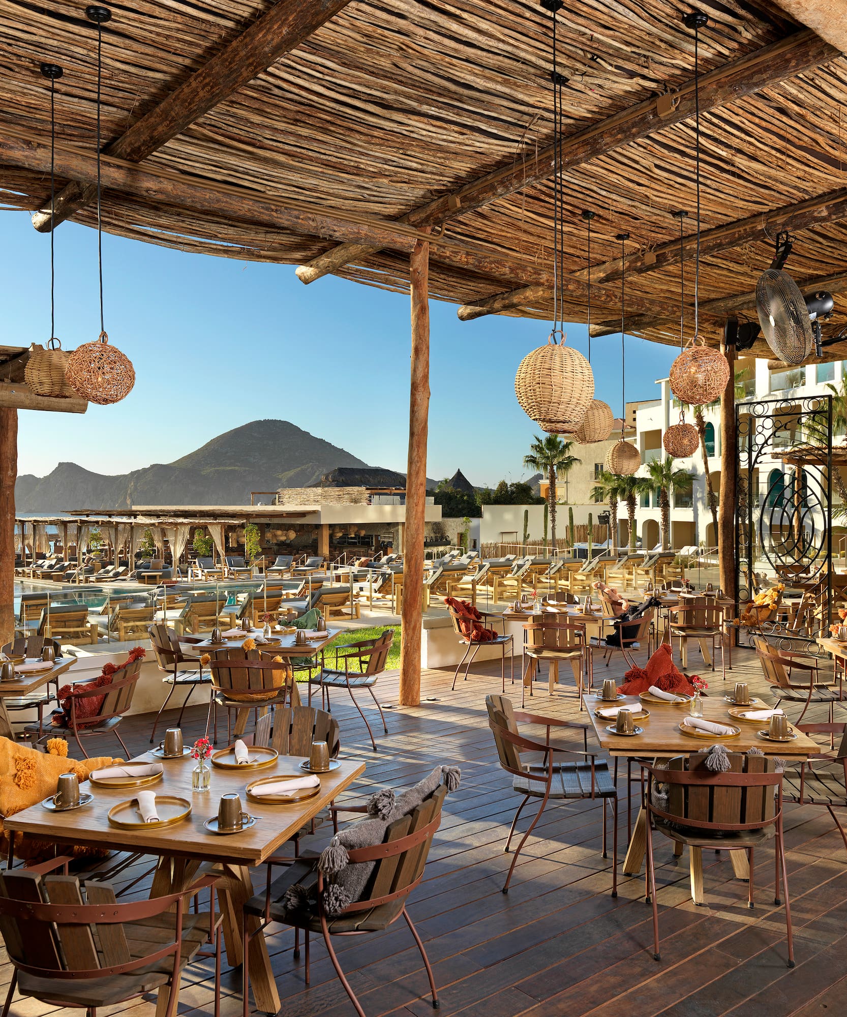 a restaurant with tables and chairs
