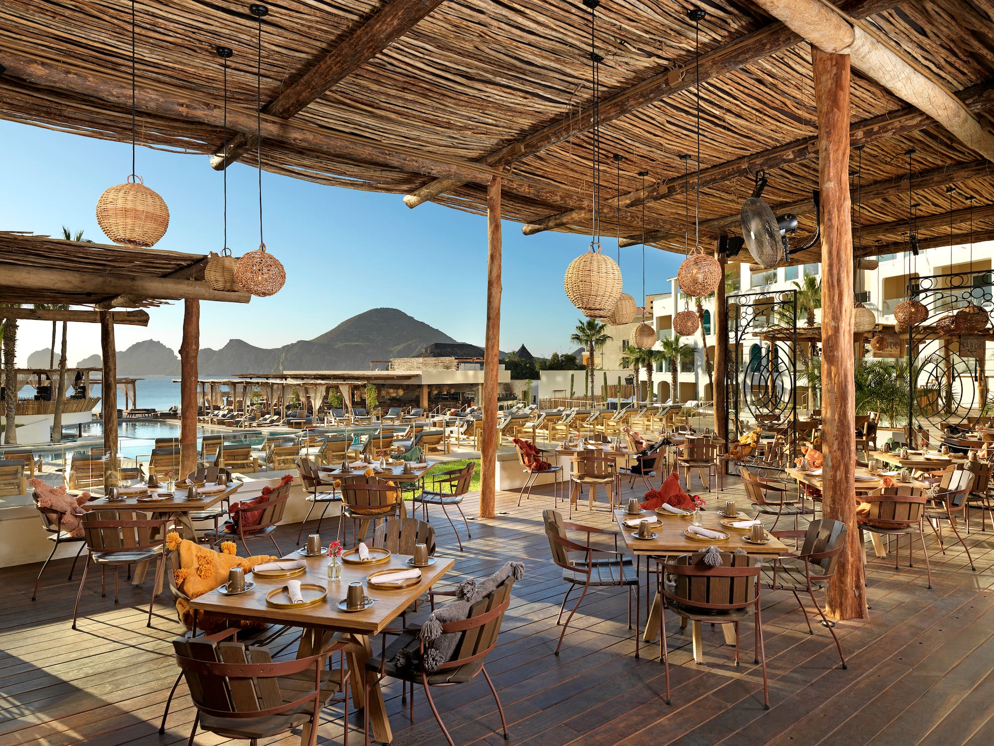 a restaurant with tables and chairs