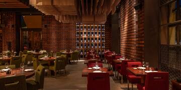a restaurant with tables and chairs