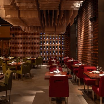 a restaurant with tables and chairs