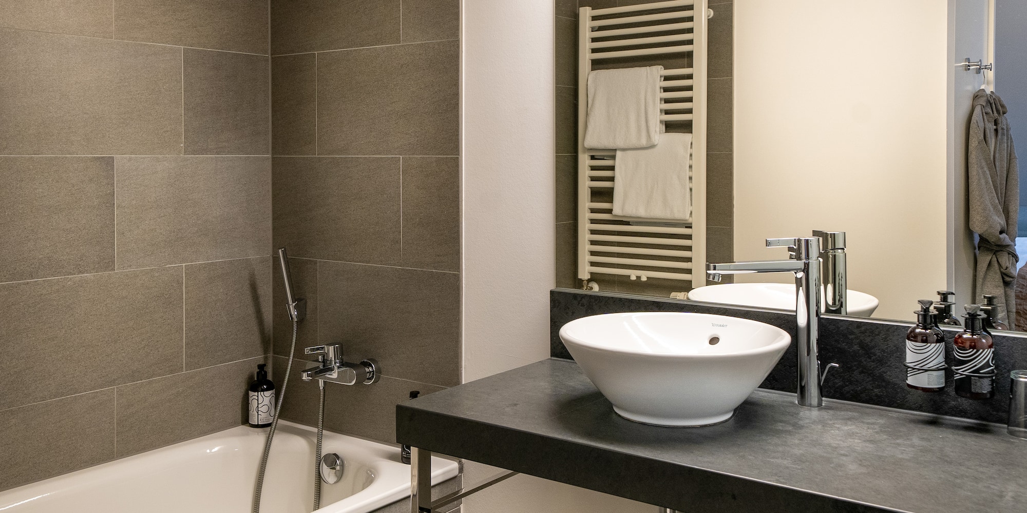 a bathroom with a sink and bathtub