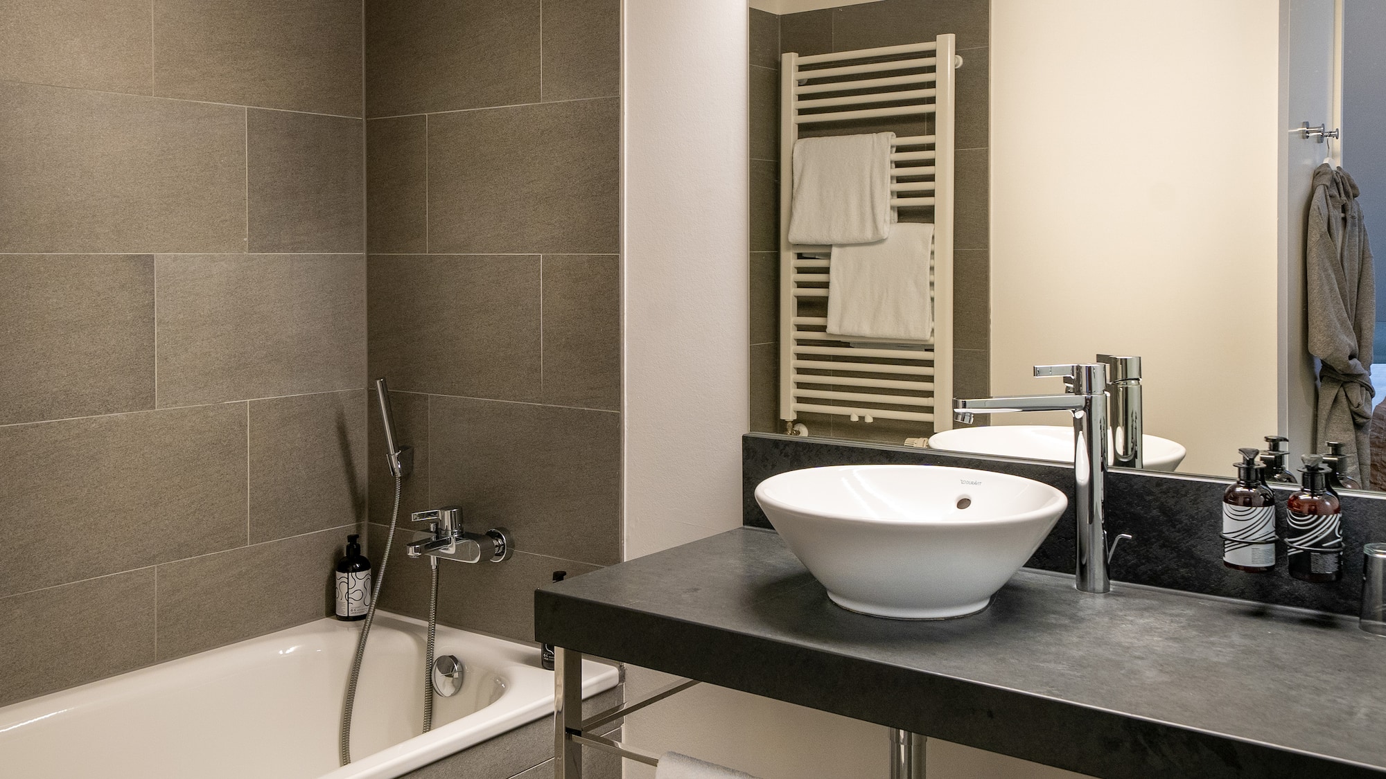 a bathroom with a sink and bathtub