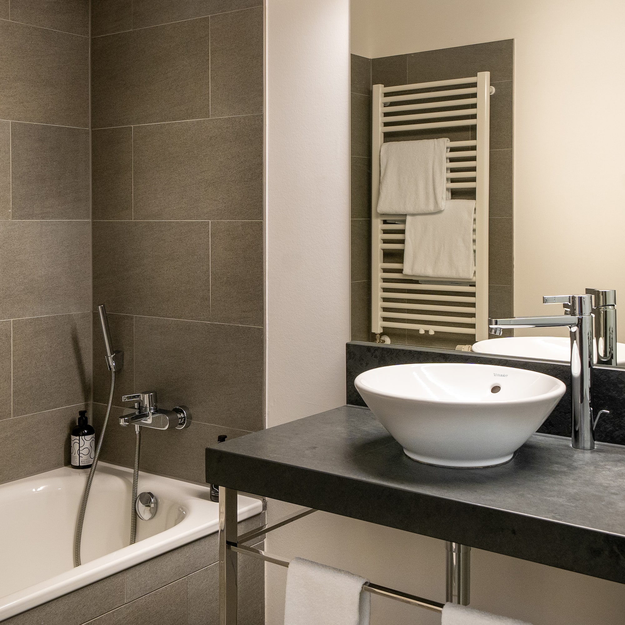 a bathroom with a sink and bathtub