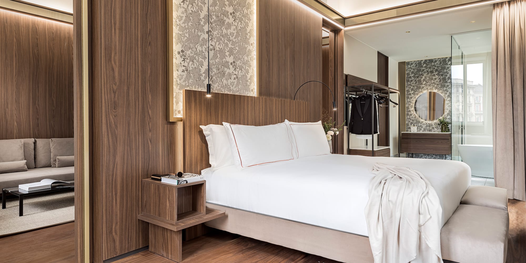 a bedroom with a bed and shoes on the floor