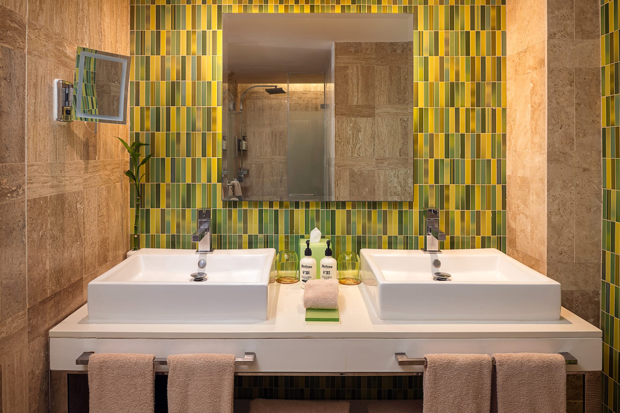 Modern bathroom with double sinks, green and yellow mosaic tiles, and large mirror. - The Reserve Suite Vue sur le jardin King - Paradisus Los Cabos - Adults Only, Los Cabos