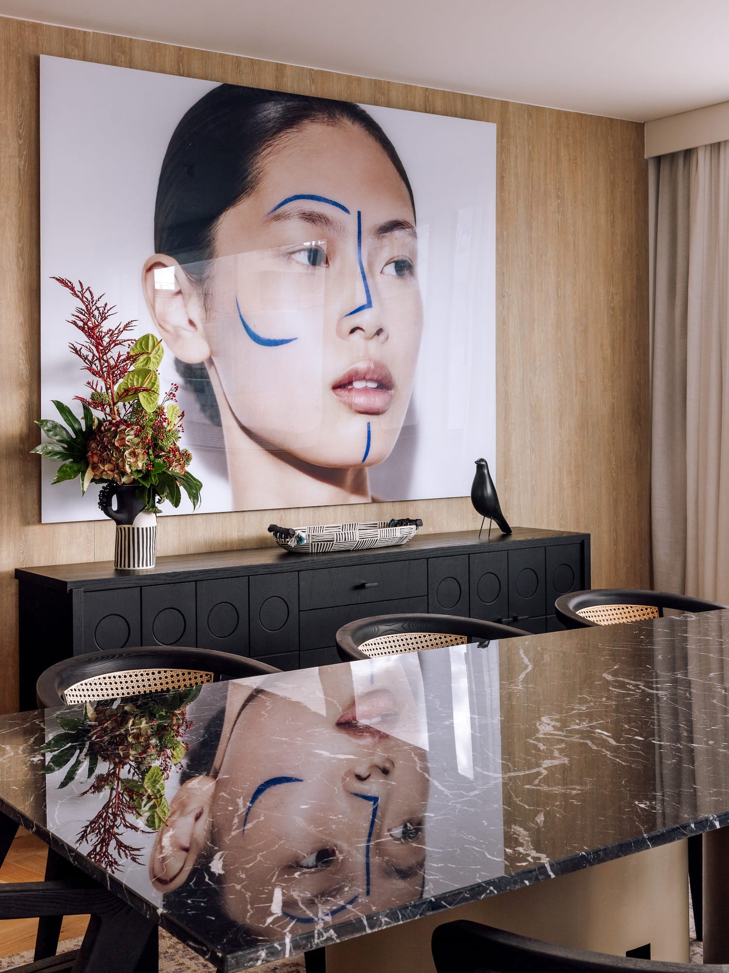 a table with a picture of a woman's face on it