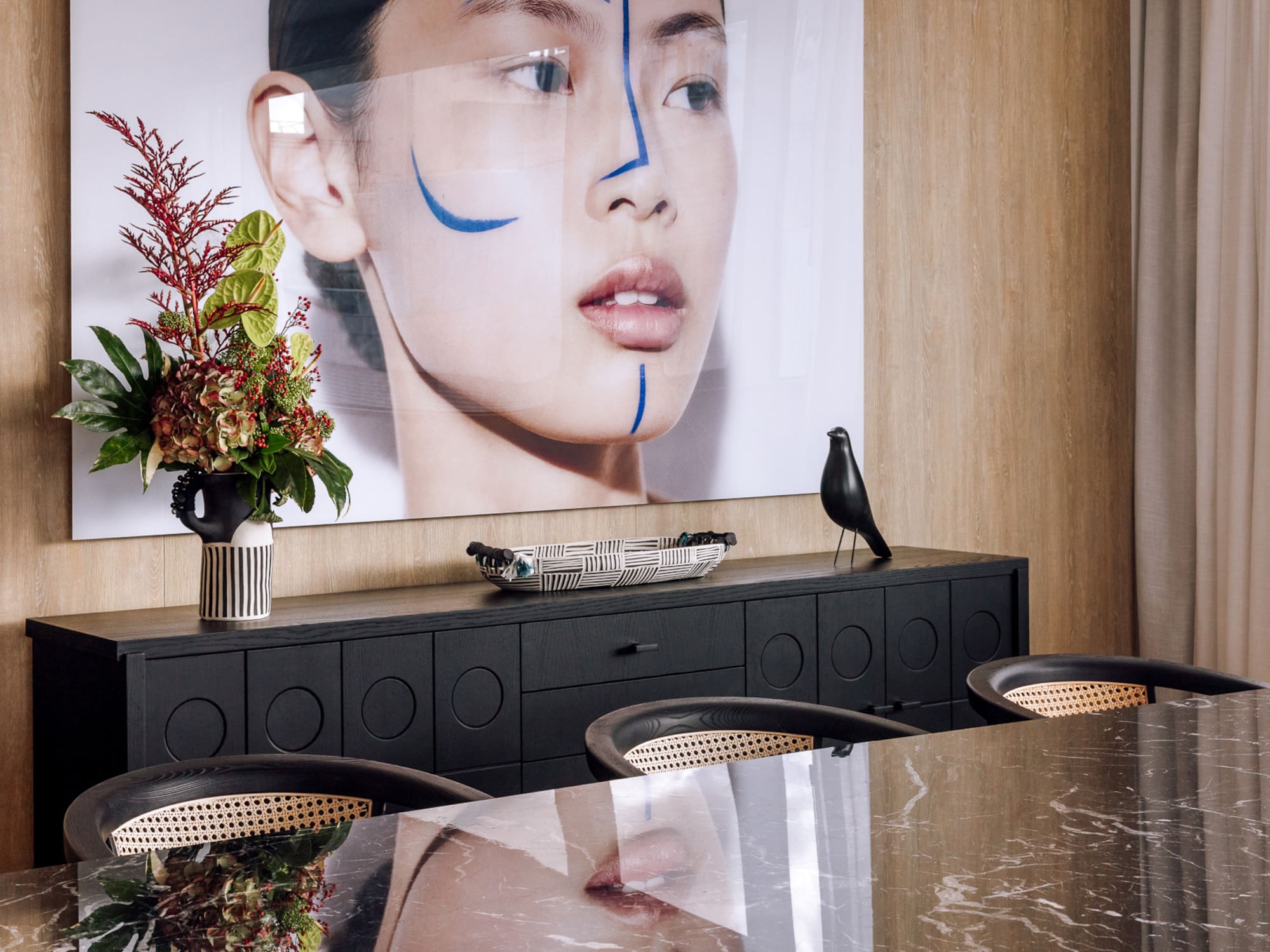 a table with a picture of a woman's face on it