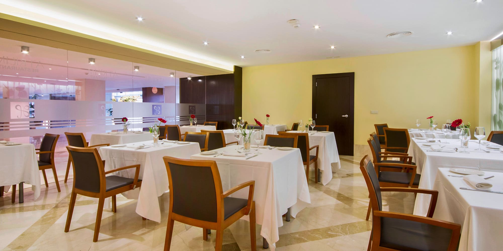 a room with tables and chairs