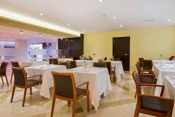 a room with tables and chairs