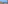 Balcony view: sunny coastal resort with blue ocean, hotels, and distant hills.