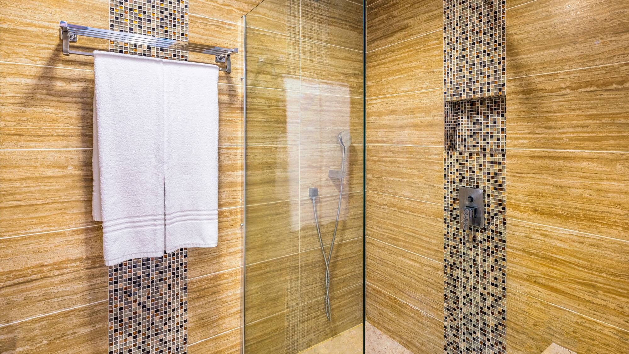 a shower with a glass door