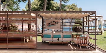 a patio with a couch and a table