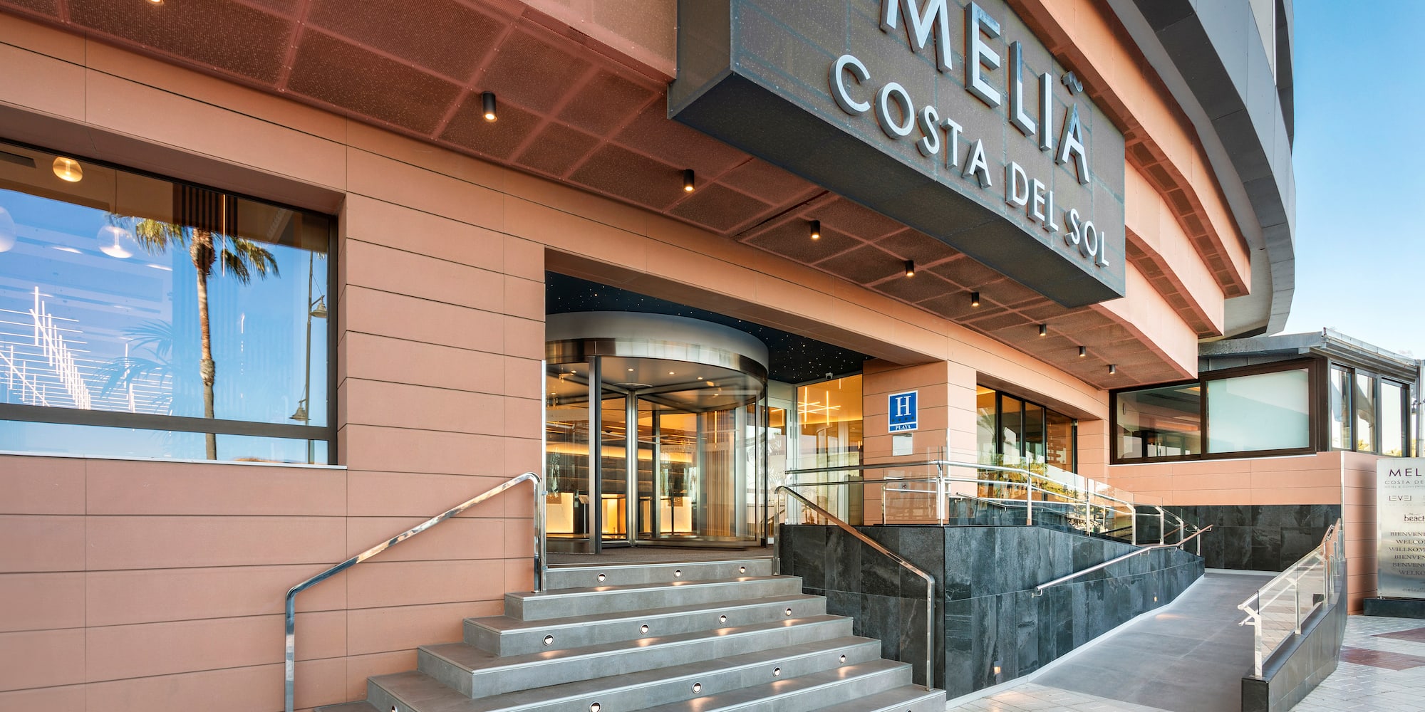 a building with stairs leading to the entrance