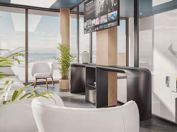 a room with a television and a large window