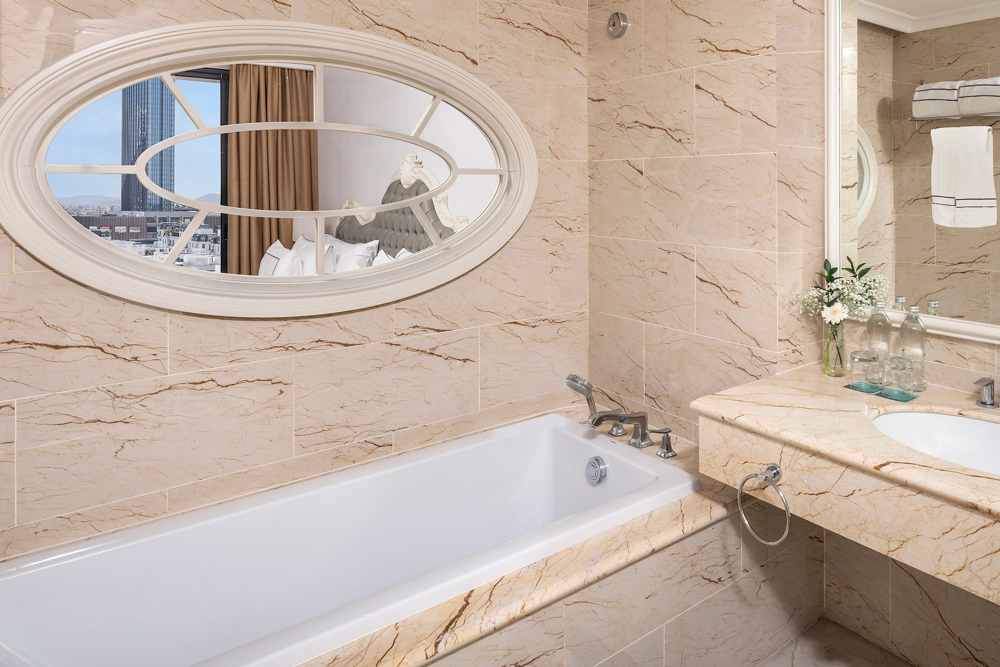 a bathroom with a bathtub and a sink