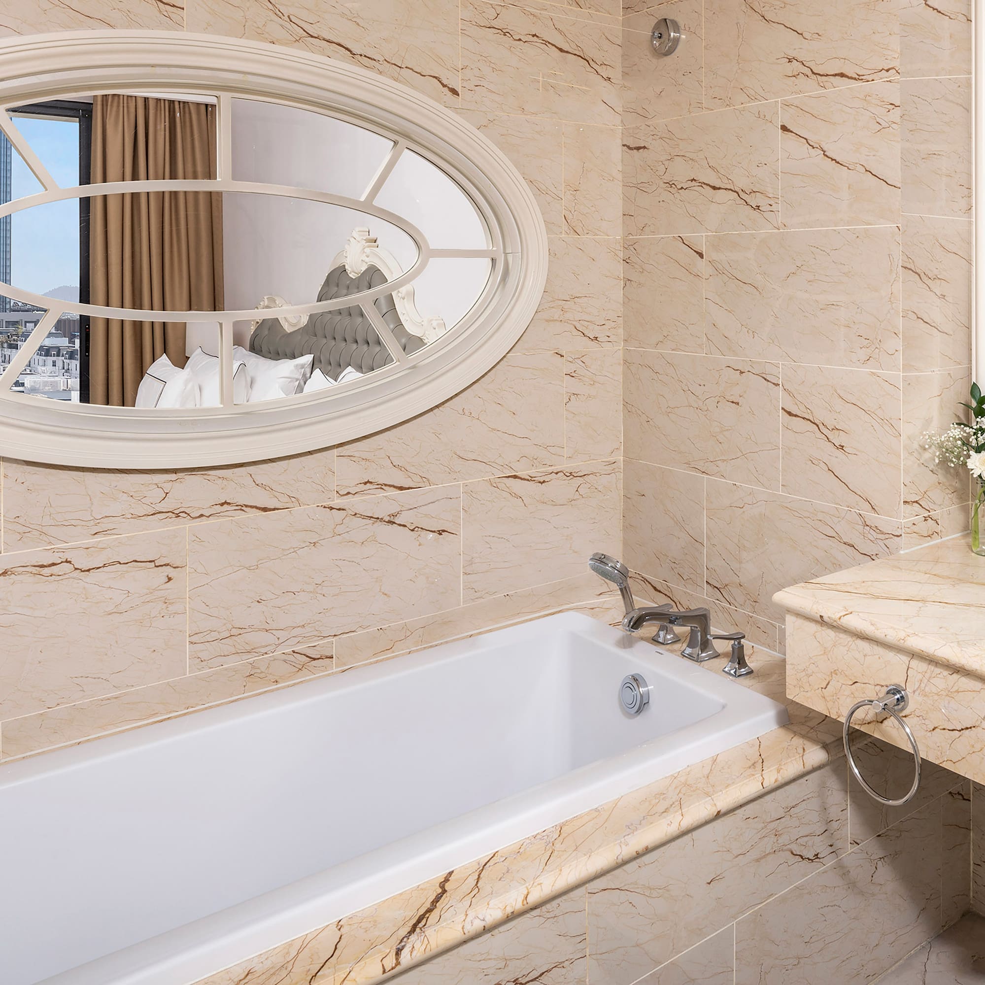 a bathroom with a bathtub and a sink