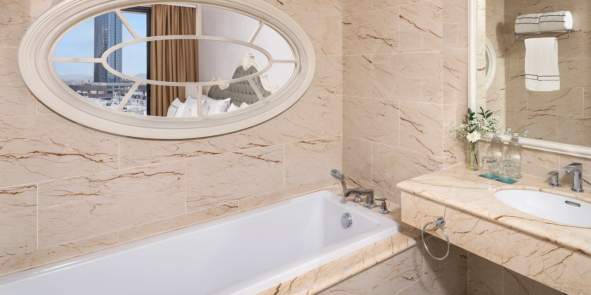 a bathroom with a bathtub and a sink