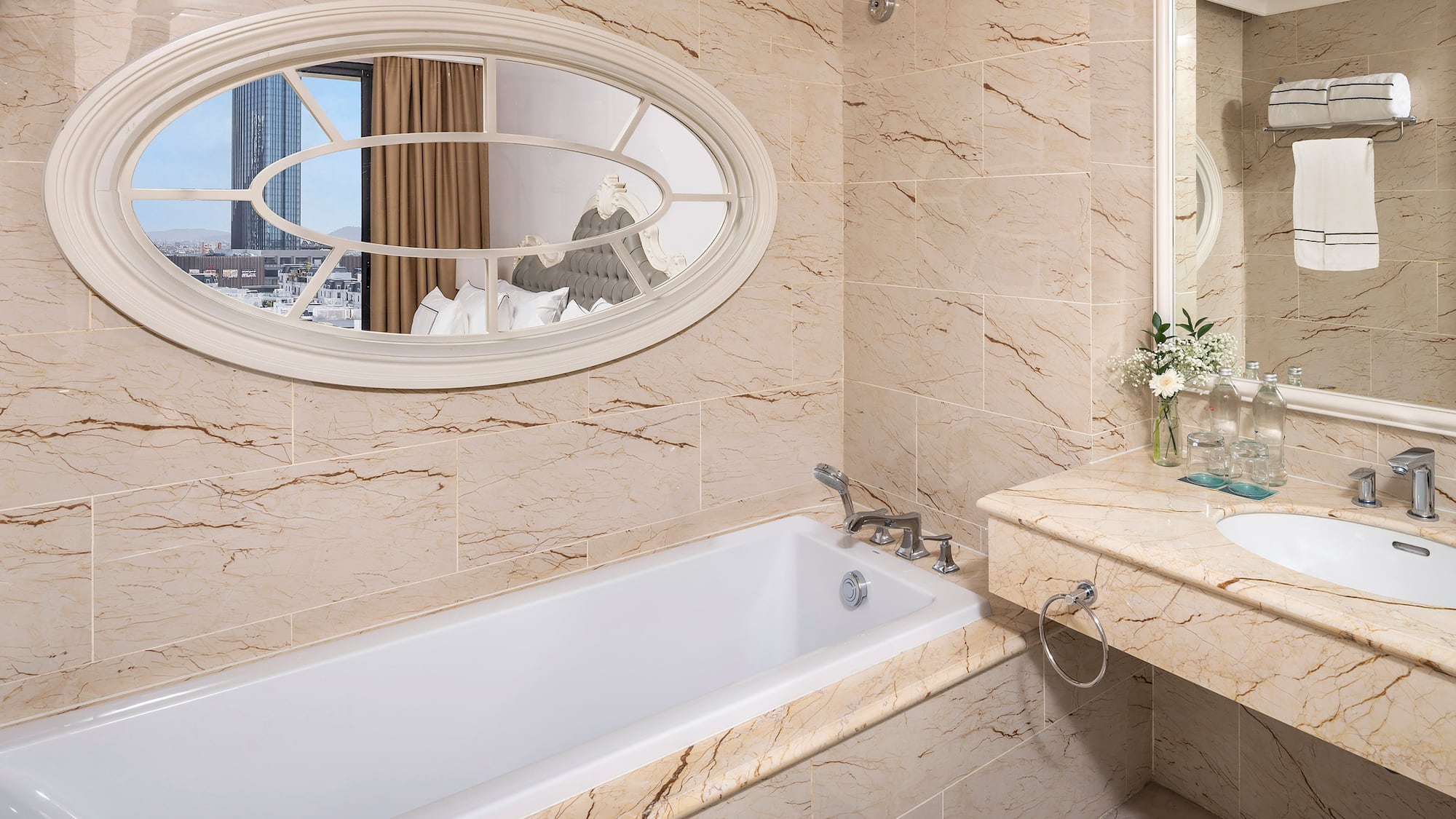 a bathroom with a bathtub and a sink