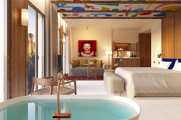 a room with a bed and a couch