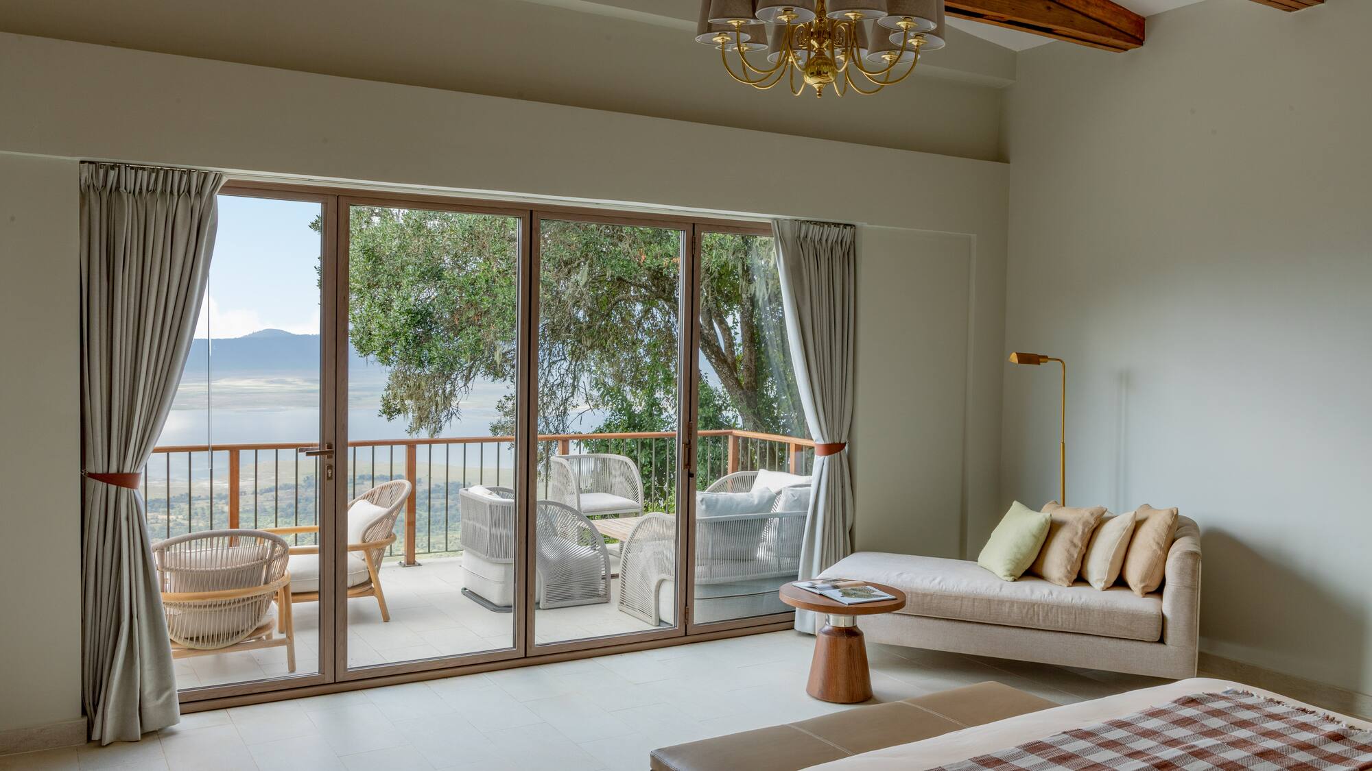 a room with a couch and a glass door