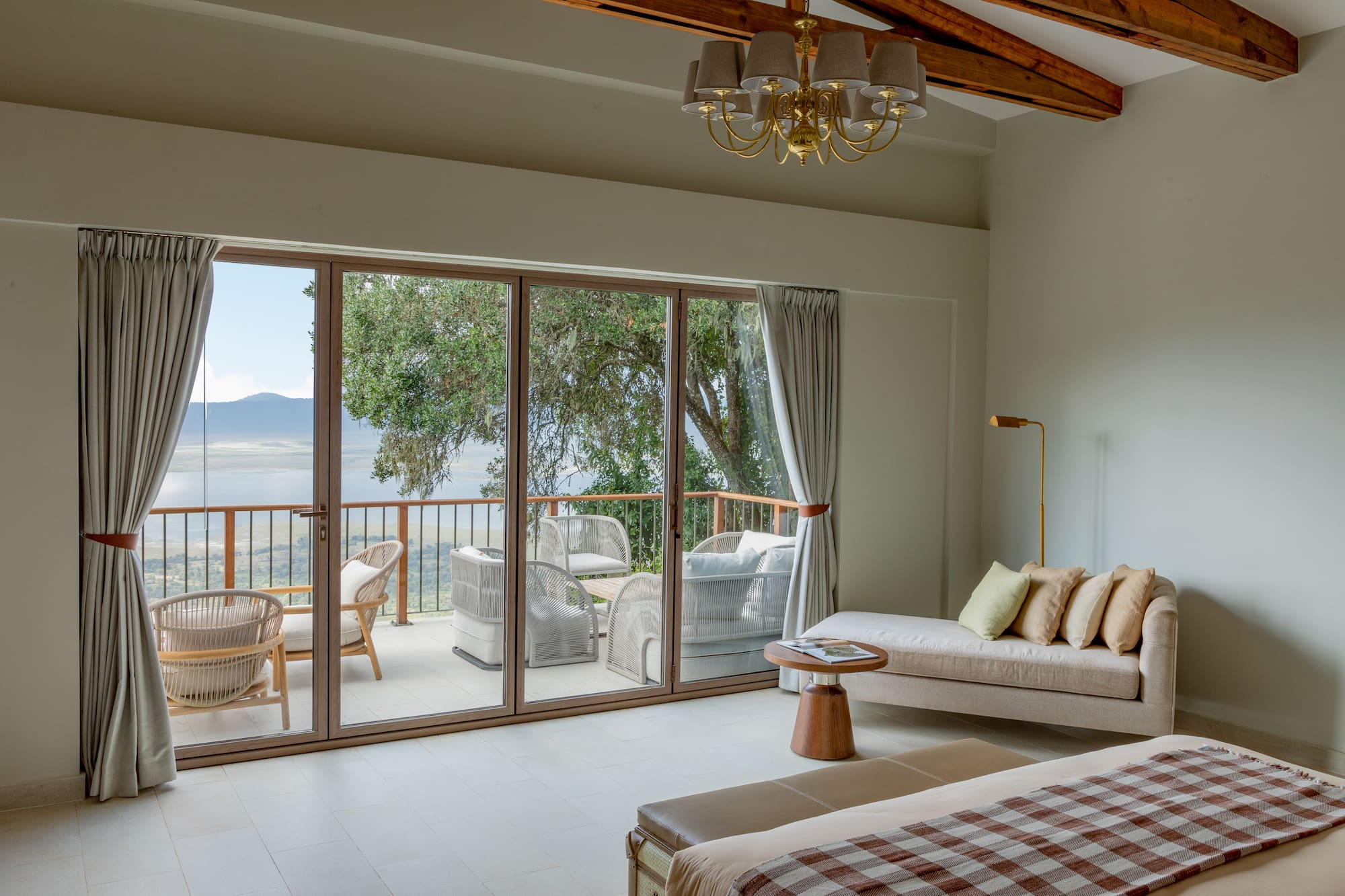 a room with a couch and a glass door