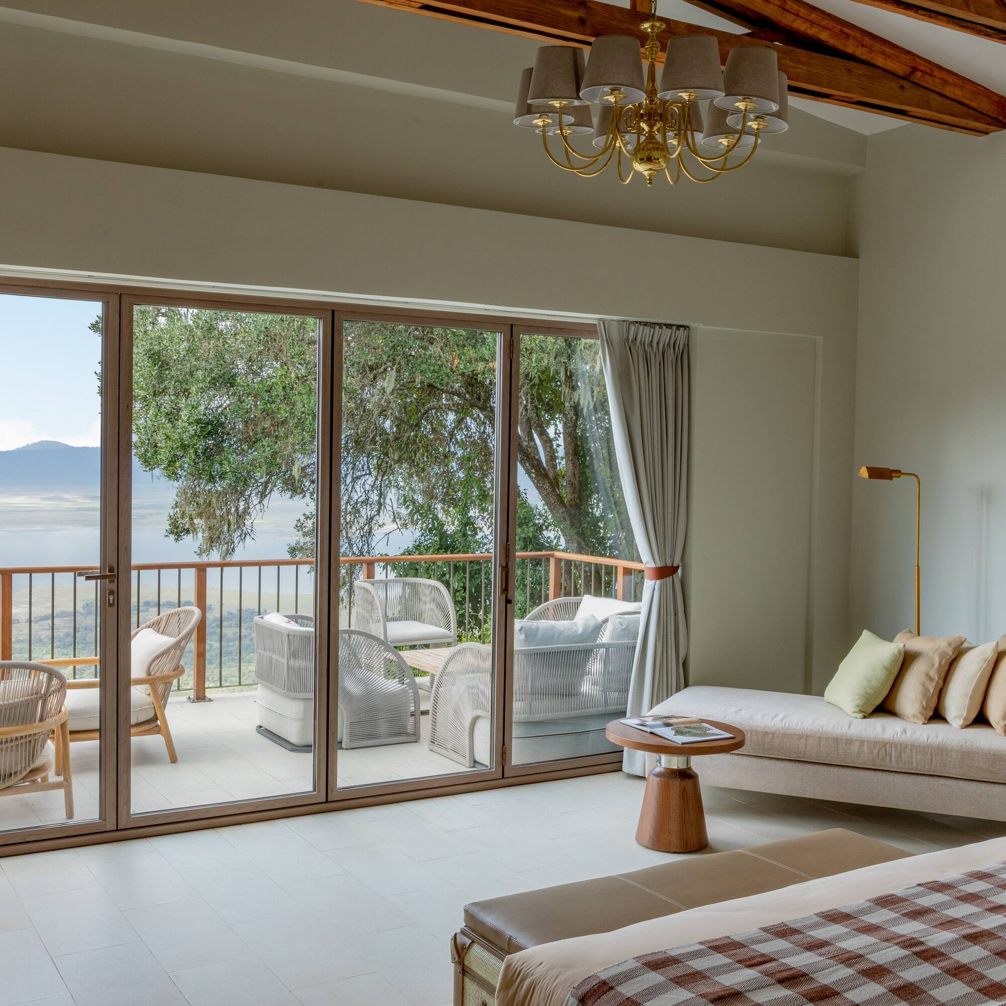 a room with a couch and a glass door